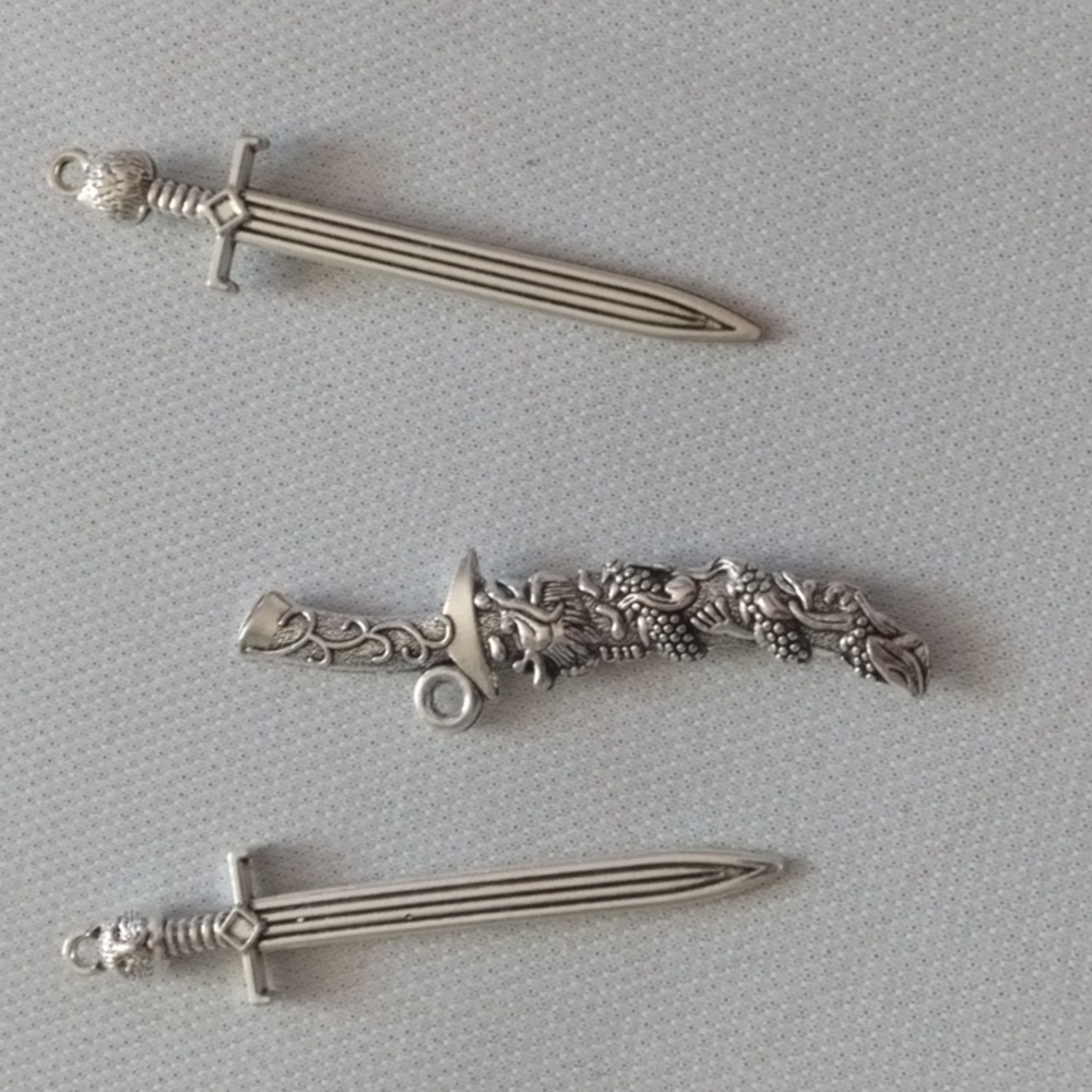 3 Silvertone Sword Pendants